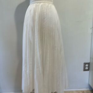 White pleaded skirt